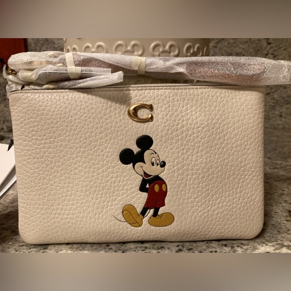 Coach Handbags - Disney X Coach Small Wristlet In Regenerative Leather With Mickey Mouse - NWT